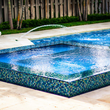 Custom Spa for Classic/Straight Edge Pool With Fountain and Sun Shelf in Miami,