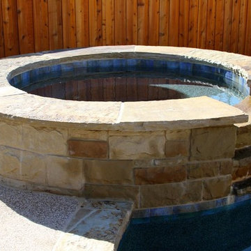 Custom Stone Hot Tub with Waterfall Feature