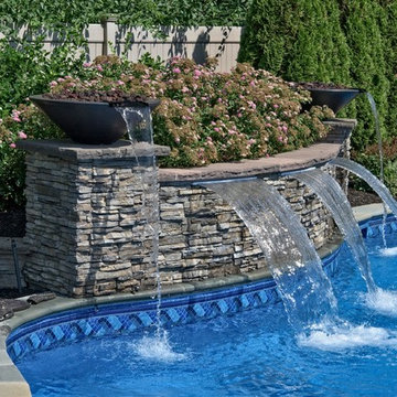 Custom swimming pool with water feature