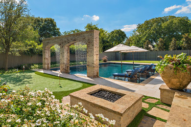 Photo of a traditional swimming pool in Dallas.