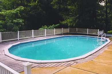 Inspiration for a large round pool remodel in Baltimore