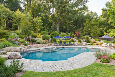 Example of a classic custom-shaped pool design in New York