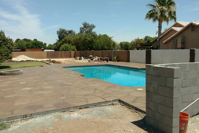Photo of a traditional swimming pool in Phoenix.
