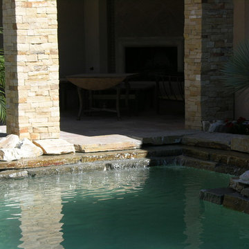 Detail of Gold Quartzite slabs as a  waterfeature coping.