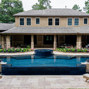 Foto di un'ampia piscina minimal personalizzata dietro casa con pedane