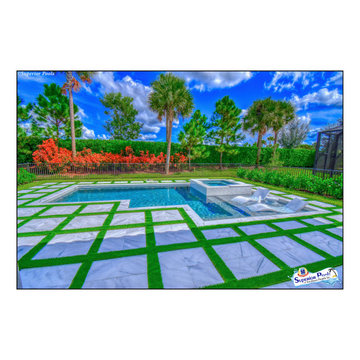 (Dunn) NAPLES, FL Superior Pools Custom Turf & Travertine Deck Pool & Spa.
