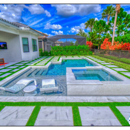 https://www.houzz.com/hznb/photos/dunn-naples-fl-superior-pools-custom-turf-and-travertine-deck-pool-and-spa-modern-pool-tampa-phvw-vp~160115047