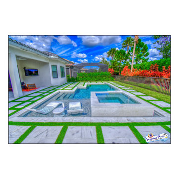 (Dunn) NAPLES, FL Superior Pools Custom Turf & Travertine Deck Pool & Spa.