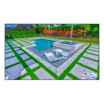 (Dunn) NAPLES, FL Superior Pools Custom Turf & Travertine Deck Pool & Spa.