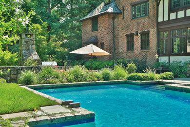 Mountain style pool photo in New York