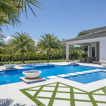 Edgy Pool With Custom Bowls and Stepping Stones in Plantation, Florida