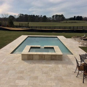 Elegant Rectangle Pool and Spa with Travertine