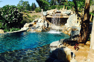 Inspiration for a tropical pool remodel in San Diego