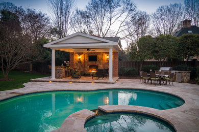 Inspiration for a mid-sized transitional backyard tile and custom-shaped natural hot tub remodel in Charlotte