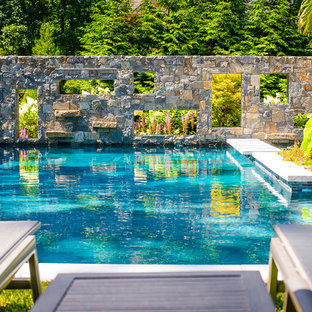This is an example of a small country backyard l-shaped pool in New York.