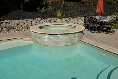 Mid-sized backyard custom-shaped hot tub photo in San Francisco