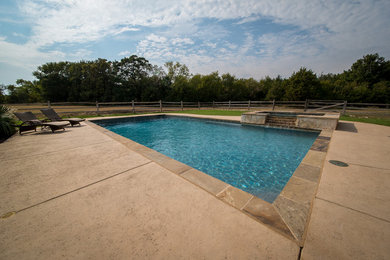 Photo of a farmhouse swimming pool in Dallas.