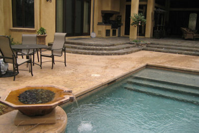 Photo of a swimming pool in Sacramento with a water feature.
