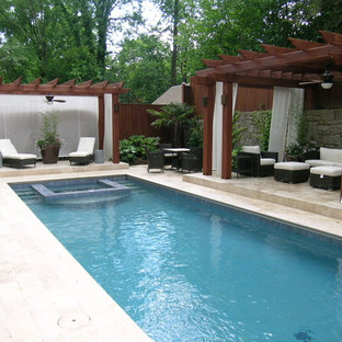 Inspiration for a mid-sized timeless backyard stone and rectangular natural hot tub remodel in Atlanta