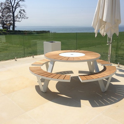 Pool - large contemporary backyard tile and rectangular natural pool idea in New York