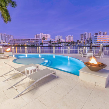 Freeform Infinity Edge Pool with Lap Pool/Spa with Fire Bowls in Ft. Lauderdale