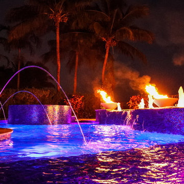 Freeform Lagoon Pool with Custom Spa LED Lights and Fire Bowls in Boynton Beach
