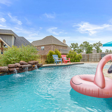 Freeform Pool, beach entry and rock waterfall