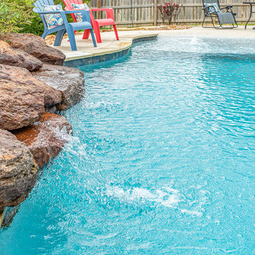 Freeform Pool, beach entry and rock waterfall