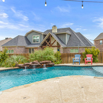 Freeform Pool, beach entry and rock waterfall