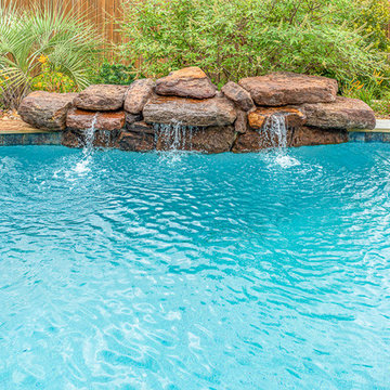 Freeform Pool, beach entry and rock waterfall