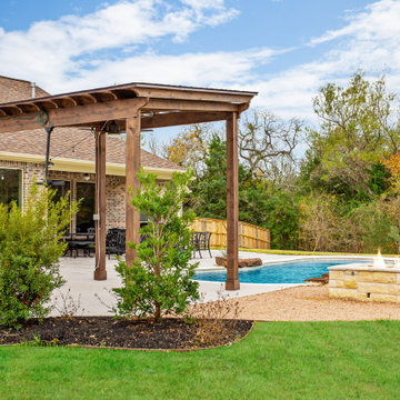 Freeform pool, Water Feature, Sun Shelf, Fire Pit and Pergola