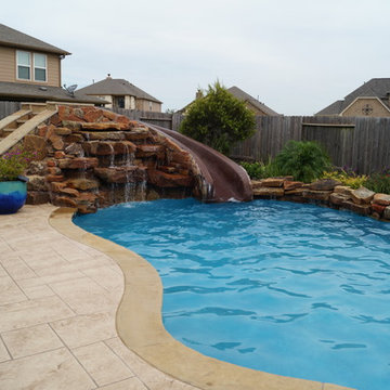 Freeform Pool with Rock Waterfall and Patio