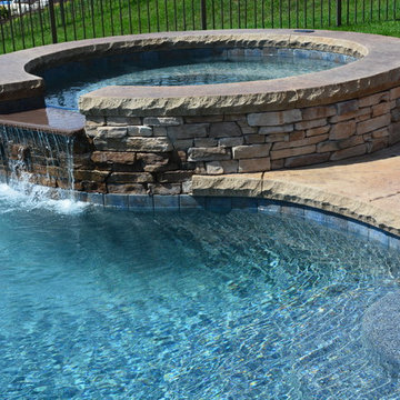 Freeform Style Pool with Raised Spa and Firepit