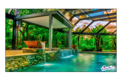 Inspiration for a rustic pool remodel in Tampa