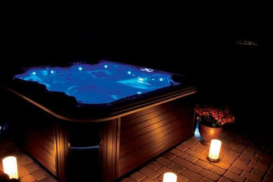 Large traditional back rectangular above ground hot tub in San Francisco.
