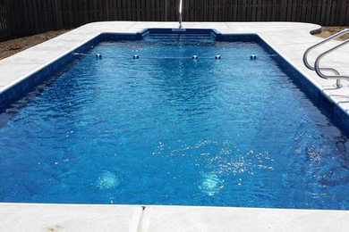 Backyard pool fountain photo in Indianapolis