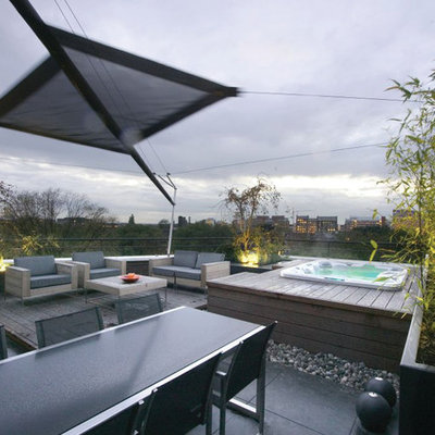 Inspiration for a contemporary rooftop rectangular aboveground hot tub remodel in Los Angeles with decking