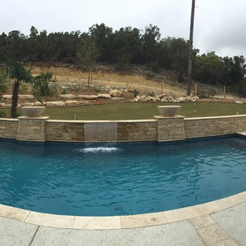 Geometric Design with Geyser and Cultured Stone Spillway