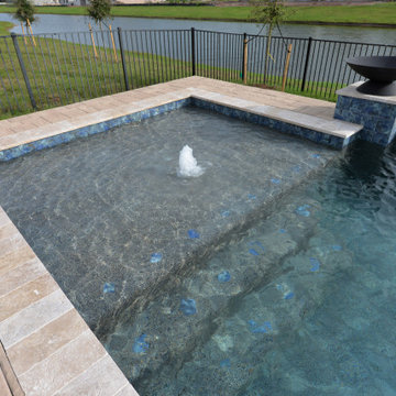 Geometric Swimming Pool with Fire bowls in St. Cloud, Florida