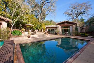 Example of a large backyard concrete and rectangular natural pool design in San Francisco