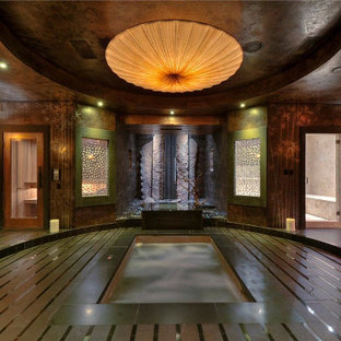 Design ideas for a mid-sized asian indoor rectangular pool in San Francisco with natural stone pavers and a hot tub.