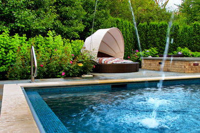 Small elegant backyard rectangular and tile hot tub photo in Chicago