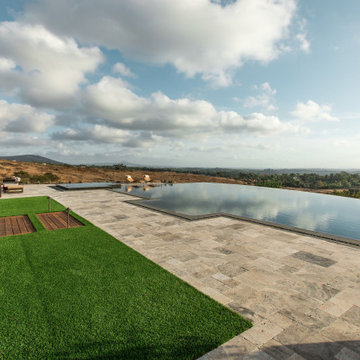 Gorgeous Infinity Pool with Multiple Outdoor Living Spaces
