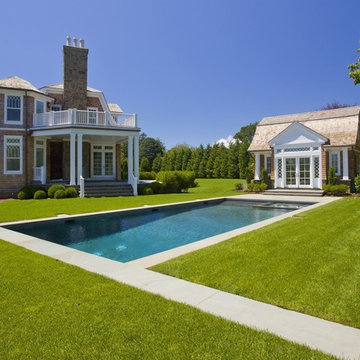 grass terrace with bluestone bordered + coping.