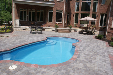 Elegant pool photo in Charlotte