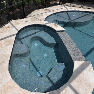 Gunite Pool and Spa in Winter Garden, FL with Travertine deck