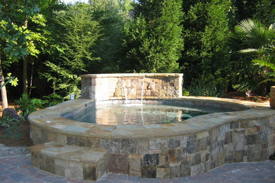 This is an example of a mediterranean swimming pool in Atlanta.