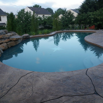 Hanover Township custom pool with boulder waterfall