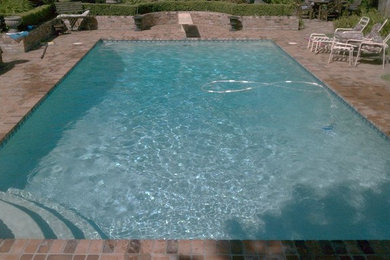 Pool - large backyard brick and rectangular pool idea in San Francisco