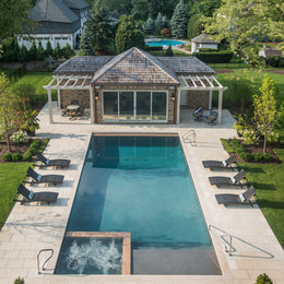 https://www.houzz.com/hznb/photos/hinsdale-il-rectangular-swimming-pool-sunshelf-and-spa-inside-traditional-pool-chicago-phvw-vp~71889628